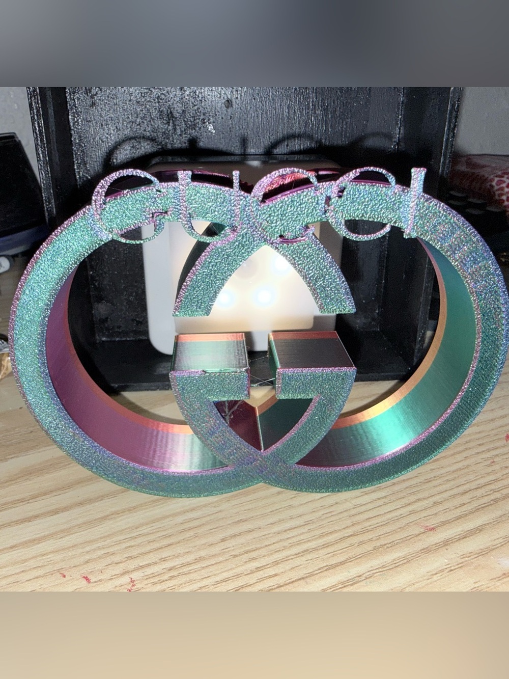 Gucci home accent iridescent color, changing purple, green gold